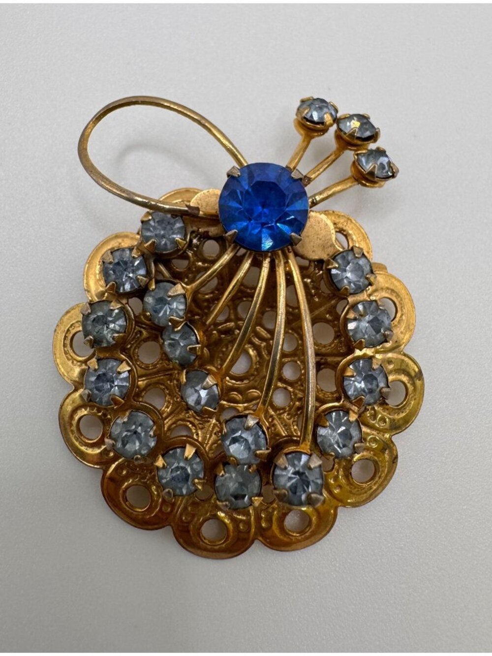 Vintage Blue Rhinestone Gold Tone Floral Brooch Pin Openwork Filigree 2”